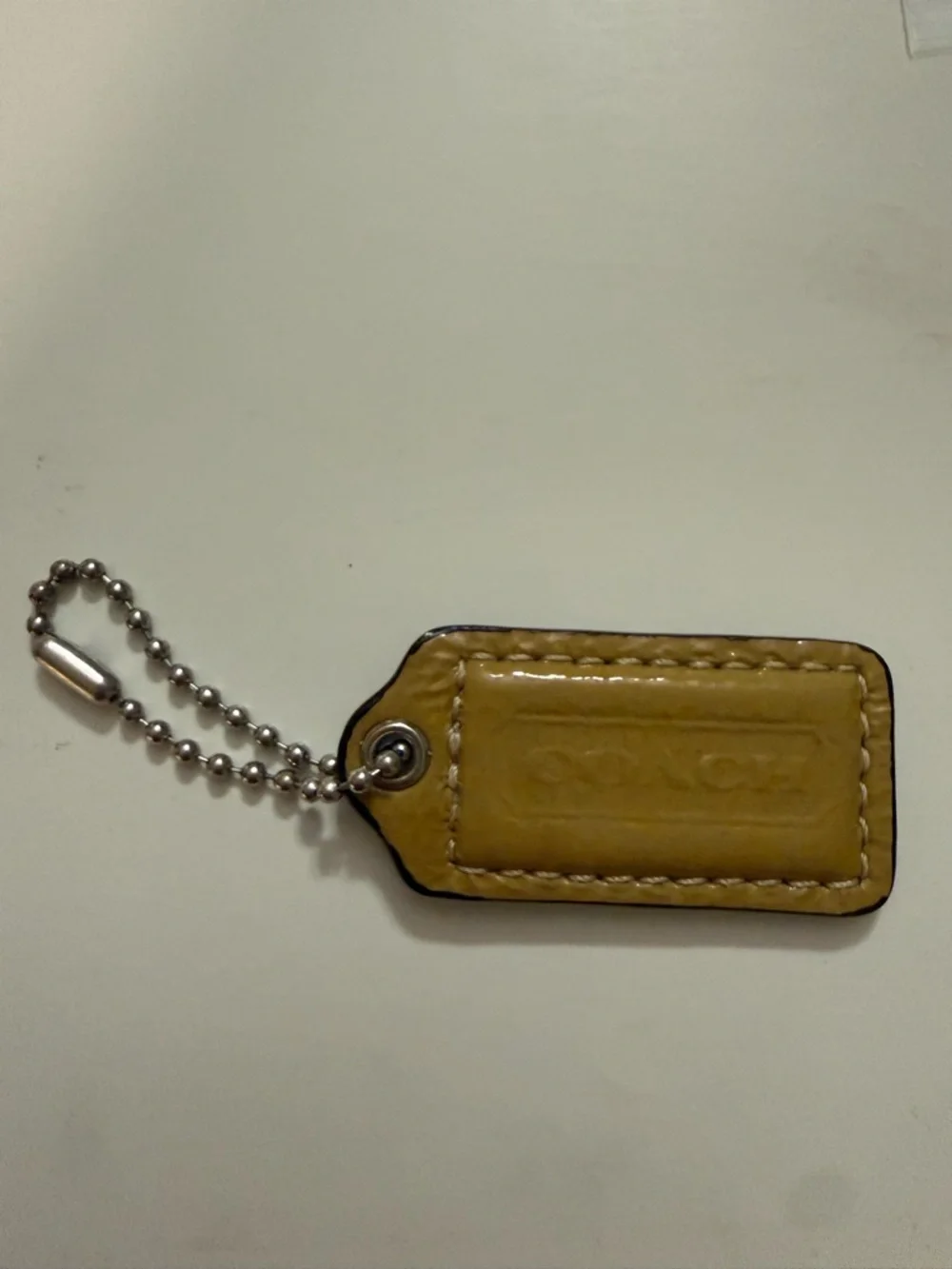 Coach Men's Mustard Leather Key Tag